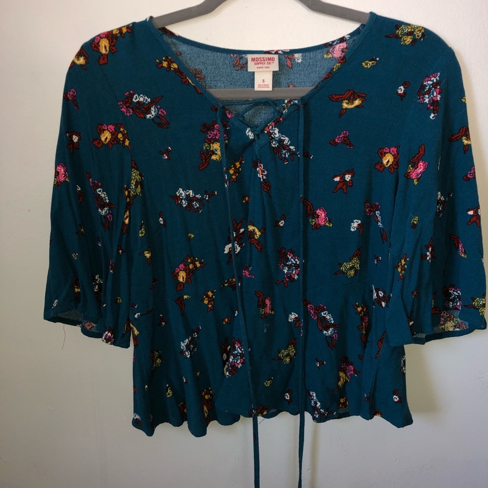 A dark blue and floral design blouse